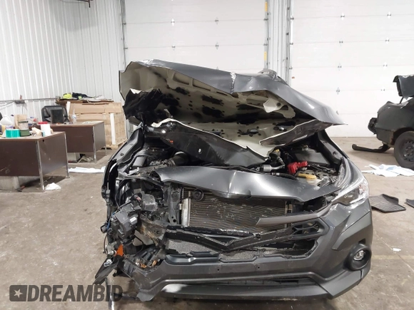 2024 Subaru Crosstrek Premium with VIN JF2GUADC8R8211377, listed as a IAAI auction lot 41953472 with 31,973 mi miles and . Bid and sale history available at DreamBid. Image 6.