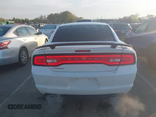 2014 Dodge Charger SE with VIN 2C3CDXBG7EH322291, listed as a IAAI auction lot 41925215 with 169,236 mi miles and . Bid and sale history available at carsss.com. Image 16.