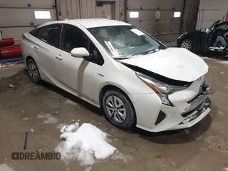 2018 Toyota Prius Two z VIN JTDKBRFU9J3072879, wystawiony jako IAAI lot #41586835 z przebiegiem 233 657 mil mil oraz . Historia ofert i sprzedaży dostępna na DreamBid. Obrazek 1.