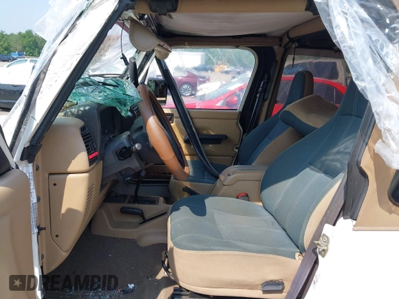 2002 Jeep Wrangler Sahara with VIN 1J4FA59S92P734763, listed as a IAAI auction lot 42411004 with 188,213 mi miles and . Bid and sale history available at DreamBid. Image 5.