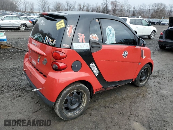 2012 Smart fortwo Pure z VIN WMEEJ3BA2CK571073, wystawiony jako Copart lot #51215135 z przebiegiem 78 686 mil mil oraz Szkoda całkowita • Salvage title. Historia ofert i sprzedaży dostępna na DreamBid. Obrazek 3.