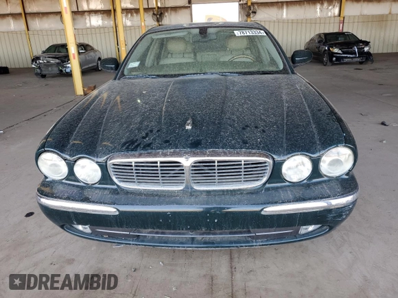 2004 Jaguar XJ with VIN SAJWA71C04SG20211, listed as a Copart auction lot 78713334 with 43,169 mi miles and Clean Title. Bid and sale history available at carsss.com. Image 5.
