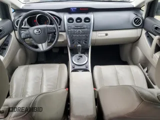 2011 Mazda CX-7 S Touring z VIN JM3ER4CL4B0371150, wystawiony jako Copart lot #52794945 z przebiegiem 147 856 mil mil oraz Czysty tytuł • Clean title. Historia ofert i sprzedaży dostępna na DreamBid. Obrazek 8.