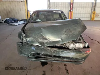 2001 Toyota Camry LE z VIN JT2BF22K510303027, wystawiony jako Copart lot #85090174 z przebiegiem 253 038 mil mil oraz Szkoda całkowita • Salvage title. Historia ofert i sprzedaży dostępna na DreamBid. Obrazek 5.