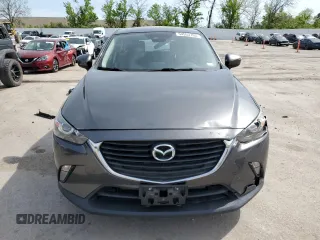 2018 Mazda CX-3 Touring z VIN JM1DKDC7XJ0300125, wystawiony jako Copart lot #54553765 z przebiegiem 83 652 mil mil oraz Szkoda całkowita • Salvage title. Historia ofert i sprzedaży dostępna na DreamBid. Obrazek 5.