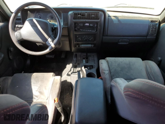 2000 Jeep Cherokee SE with VIN 1J4FF27SXYL140055, listed as a Copart auction lot 70315454 with 176,017 mi miles and Salvage title. Bid and sale history available at DreamBid. Image 8.