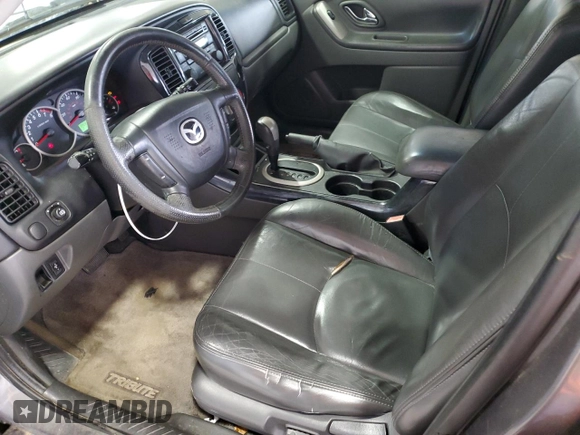 2005 Mazda Tribute S with VIN 4F2CZ96115KM59847, listed as a Copart auction lot 67740144 with 217,053 mi miles and Salvage Title. Bid and sale history available at carsss.com. Image 7.
