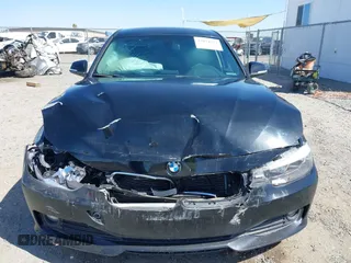 2015 BMW 3 Series 320i with VIN WBA3B1C57FK138441, listed as a IAAI auction lot 42034649 with Not Provided miles. Bid and sale history available at carsss.com. Image 11.