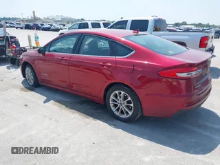 2019 Ford Fusion Hybrid SE with VIN 3FA6P0LU6KR243678, listed as a IAAI auction lot 40004890 with 138,533 mi miles. Bid and sale history available at carsss.com. Image 3.
