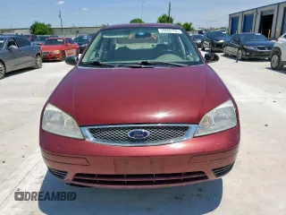 2007 Ford Focus S z VIN 1FAFP34NX7W324146, wystawiony jako Copart lot #59006755 z przebiegiem 160 398 mil mil oraz Szkoda całkowita • Salvage title. Historia ofert i sprzedaży dostępna na DreamBid. Obrazek 5.