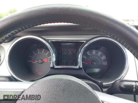 2007 Ford Mustang Deluxe with VIN 1ZVFT80N875206771, listed as a IAAI auction lot 42672678 with 163,045 mi miles and . Bid and sale history available at DreamBid. Image 7.