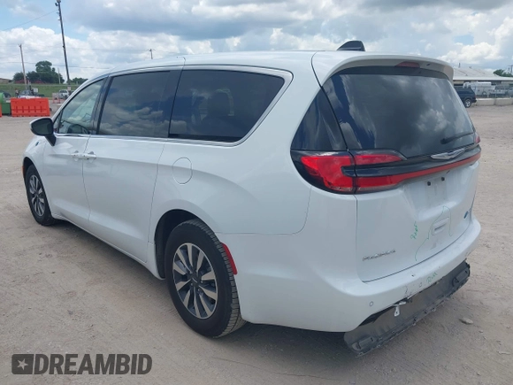 2023 Chrysler Pacifica Hybrid Touring L with VIN 2C4RC1L71PR622474, listed as a IAAI auction lot 42595061 with 55,880 mi miles and . Bid and sale history available at DreamBid. Image 3.