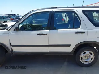 2003 Honda CR-V LX z VIN JHLRD68403C017375, wystawiony jako IAAI lot #42237124 z przebiegiem 172 054 mil mil oraz . Historia ofert i sprzedaży dostępna na DreamBid. Obrazek 14.