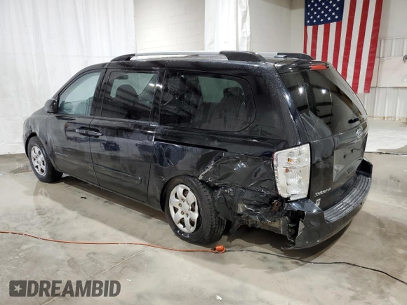 2010 Kia Sedona LX with VIN KNDMG4C3XA6355279, listed as a Copart auction lot 74080134 with 157,006 mi miles and Salvage Title. Bid and sale history available at carsss.com. Image 2.