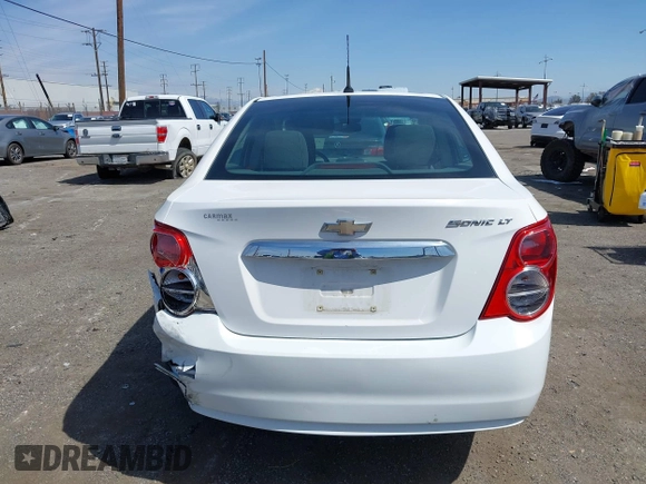 2014 Chevrolet Sonic LT with VIN 1G1JC5SH9E4212898, listed as a IAAI auction lot 41852112 with 121,382 mi miles and . Bid and sale history available at DreamBid. Image 16.