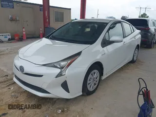 2017 Toyota Prius Two with VIN JTDKBRFU2H3035537, listed as a IAAI auction lot 42408704 with 179,112 mi miles and . Bid and sale history available at DreamBid. Image 2.