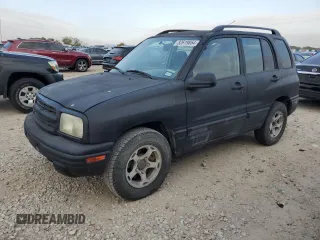 2000 Chevrolet Tracker z VIN 2CNBE13C4Y6920783, wystawiony jako Copart lot #82619854 z przebiegiem 96 620 mil mil oraz Czysty tytuł • Clean title. Historia ofert i sprzedaży dostępna na DreamBid. Obrazek 1.