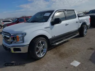 2018 Ford F-150 XL with VIN 1FTEW1C59JKD98218, listed as a IAAI auction lot 41406012 with 103,435 mi miles. Bid and sale history available at carsss.com. Image 2.