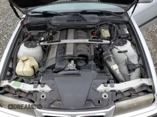 1999 BMW 3 Series 328ic with VIN WBABK7331XET68084, listed as a Copart auction lot 86205884 with 0 mi miles and Salvage Title. Bid and sale history available at carsss.com. Image 13.