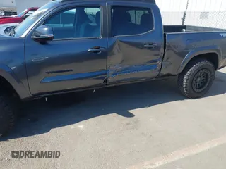 2020 Toyota Tacoma SR5 with VIN 3TMBZ5DN9LM025501, listed as a IAAI auction lot 42680028 with 109,404 mi miles and . Bid and sale history available at DreamBid. Image 6.