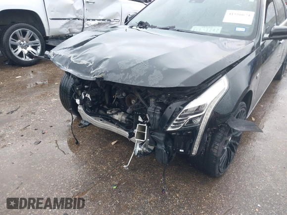 2017 Cadillac CT6 Luxury AWD z VIN 1G6KD5RS1HU207177, wystawiony jako IAAI lot #41556674 z przebiegiem 95 085 mil mil oraz . Historia ofert i sprzedaży dostępna na DreamBid. Obrazek 6.