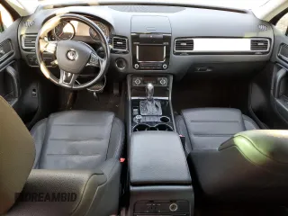 2012 Volkswagen Touareg Sport z VIN WVGEF9BP7CD006020, wystawiony jako Copart lot #88211145 z przebiegiem 180 729 mil mil oraz Szkoda całkowita • Salvage title. Historia ofert i sprzedaży dostępna na DreamBid. Obrazek 8.