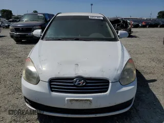 2006 Hyundai Accent GLS z VIN KMHCN46C16U013795, wystawiony jako Copart lot #60937485 z przebiegiem 133 964 mil mil oraz Czysty tytuł • Clean title. Historia ofert i sprzedaży dostępna na DreamBid. Obrazek 5.