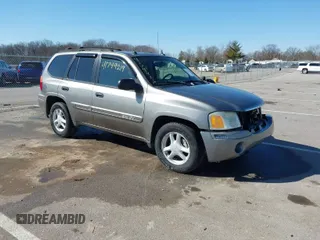 2005 GMC Envoy SLE with VIN 1GKDT13S252331044, listed as a IAAI auction lot 41749219 with 263,876 mi miles. Bid and sale history available at carsss.com. Image 1.
