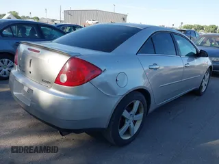 2006 Pontiac G6 GTP with VIN 1G2ZM551064133597, listed as a IAAI auction lot 42383557 with 240,918 mi miles and . Bid and sale history available at DreamBid. Image 4.