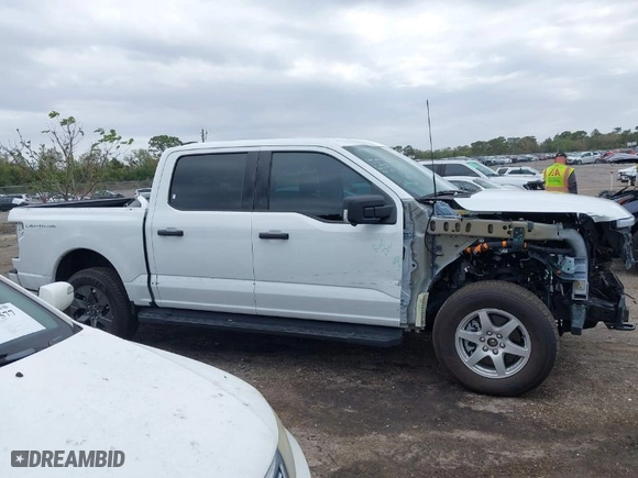 2024 Ford F-150 Lightning XLT with VIN 1FTVW3LKXRWG01185, listed as a IAAI auction lot 41679606 with NaN miles. Bid and sale history available at carsss.com. Image 14.