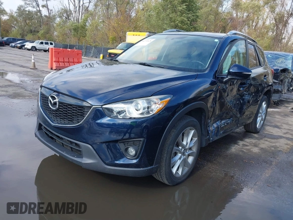 2015 Mazda CX-5 Grand Touring with VIN JM3KE4DY7F0478823, listed as a IAAI auction lot 40731626 with 82,884 mi miles. Bid and sale history available at carsss.com. Image 2.