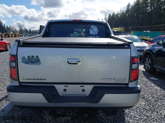 2013 Honda Ridgeline Sport with VIN 5FPYK1F70DB015247, listed as a IAAI auction lot 41693038 with 81,386 mi miles. Bid and sale history available at carsss.com. Image 16.