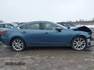 2014 Mazda 6 i Touring with VIN JM1GJ1T53E1112768, listed as a IAAI auction lot 41727440 with 166,081 mi miles and . Bid and sale history available at DreamBid. Image 14.