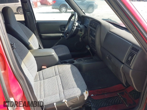 2001 Jeep Cherokee Sport z VIN 1J4FT48S01L508039, wystawiony jako IAAI lot #42743009 z przebiegiem 200 074 mil mil oraz . Historia ofert i sprzedaży dostępna na DreamBid. Obrazek 5.