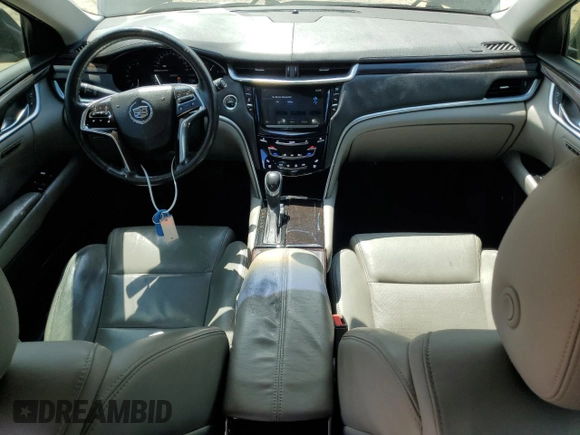 2015 Cadillac XTS Luxury z VIN 2G61M5S32F9169354, wystawiony jako Copart lot #54887215 z przebiegiem 138 795 mil mil oraz Szkoda całkowita • Salvage title. Historia ofert i sprzedaży dostępna na DreamBid. Obrazek 8.