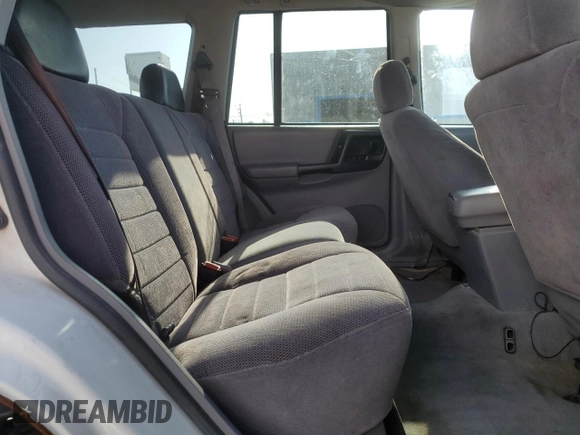 1998 Jeep Grand Cherokee Laredo with VIN 1J4GZ58S6WC319444, listed as a Copart auction lot 53147665 with 217,068 mi miles and Salvage Title. Bid and sale history available at carsss.com. Image 11.