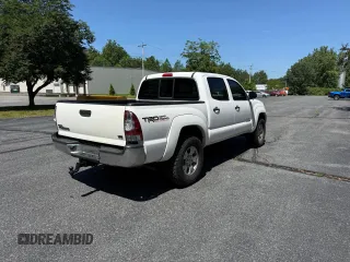 2013 Toyota Tacoma with VIN 5TFLU4EN1DX063442, listed as a Copart auction lot 62521295 with 211,682 mi miles and Clean title. Bid and sale history available at DreamBid. Image 4.