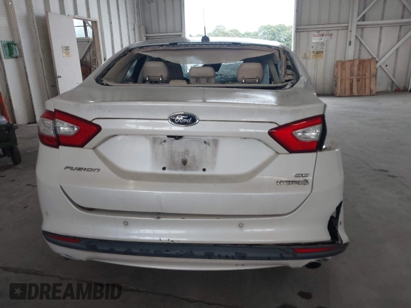 2013 Ford Fusion SE Hybrid with VIN 3FA6P0LU8DR357054, listed as a IAAI auction lot 42372168 with 143,979 mi miles and . Bid and sale history available at DreamBid. Image 16.