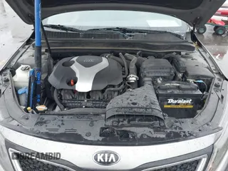 2015 Kia Optima SX Turbo with VIN 5XXGR4A66FG361755, listed as a IAAI auction lot 41199887 with 114,179 mi miles. Bid and sale history available at carsss.com. Image 10.