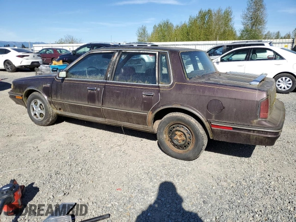 1987 Oldsmobile Cutlass Ciera with VIN 2G3AM51RXH9391582, listed as a Copart auction lot 53736795 with 81,728 mi miles and Clean Title. Bid and sale history available at DreamBid. Image 2.