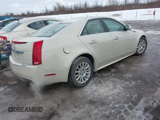 2010 Cadillac CTS Luxury with VIN 1G6DG5EG2A0109533, listed as a IAAI auction lot 41659590 with 110,749 mi miles and . Bid and sale history available at DreamBid. Image 4.