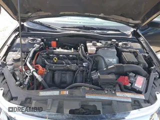 2012 Ford Fusion Hybrid z VIN 3FADP0L31CR380821, wystawiony jako IAAI lot #42332256 z przebiegiem 59 431 mil mil oraz . Historia ofert i sprzedaży dostępna na DreamBid. Obrazek 10.