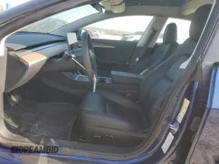 2023 Tesla Model 3 z VIN 5YJ3E1EA9PF712542, wystawiony jako Copart lot #52124295 z przebiegiem 13 154 mil mil oraz Czysty tytuł • Clean title. Historia ofert i sprzedaży dostępna na DreamBid. Obrazek 7.