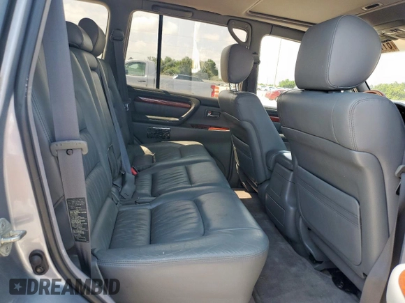 2001 Lexus LX 470 z VIN JTJHT00W313504330, wystawiony jako Copart lot #61126435 z przebiegiem 87 049 mil mil oraz Czysty tytuł • Clean title. Historia ofert i sprzedaży dostępna na DreamBid. Obrazek 11.