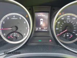 2016 Hyundai Santa Fe z VIN 5XYZTDLB0GG338313, wystawiony jako IAAI lot #42103866 z przebiegiem 111 555 mil mil oraz . Historia ofert i sprzedaży dostępna na DreamBid. Obrazek 7.