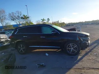 2019 Infiniti QX60 LUXE with VIN 5N1DL0MN0KC548592, listed as a IAAI auction lot 41305876 with 142,064 mi miles. Bid and sale history available at carsss.com. Image 13.