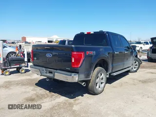 2022 Ford F-150 XL with VIN 1FTFW1E82NKD87353, listed as a IAAI auction lot 41769006 with 69,913 mi miles. Bid and sale history available at carsss.com. Image 4.