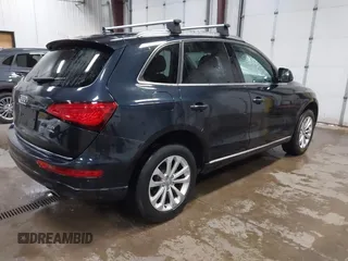 2016 Audi Q5 Premium Plus with VIN WA1L2AFP0GA081744, listed as a IAAI auction lot 42064231 with 87,824 mi miles and . Bid and sale history available at DreamBid. Image 4.