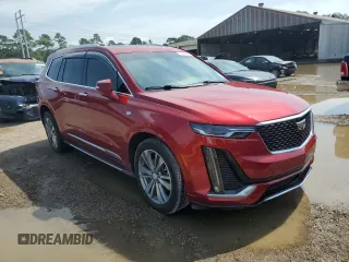2022 Cadillac XT6 Premium Luxury with VIN 1GYKPCRS7NZ101706, listed as a Copart auction lot 63389985 with 27,021 mi miles and Salvage title. Bid and sale history available at DreamBid. Image 4.