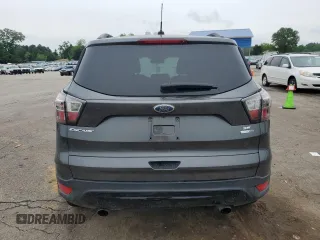 2017 Ford Escape SE z VIN 1FMCU9GD1HUB35003, wystawiony jako Copart lot #56502385 z przebiegiem 74 409 mil mil oraz Szkoda całkowita • Salvage title. Historia ofert i sprzedaży dostępna na DreamBid. Obrazek 6.